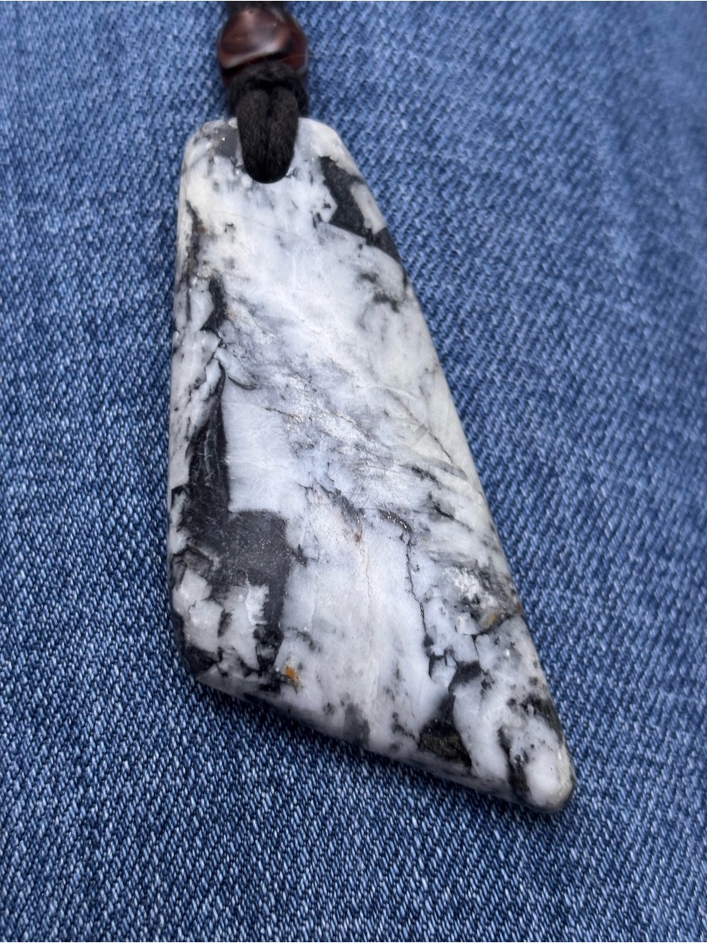 Handcrafted Pinolite pendant. Sourced by hand in British Columbia leather cord